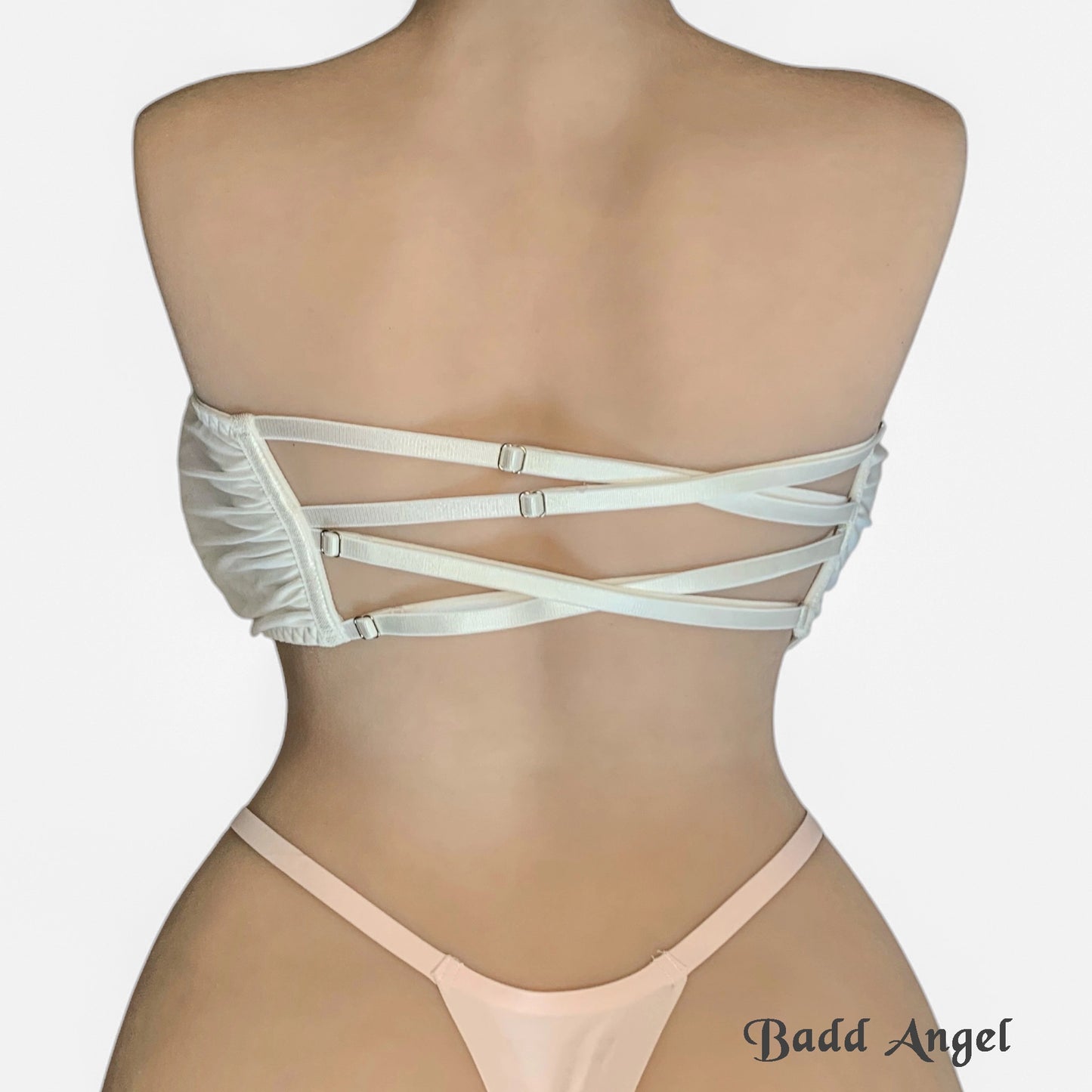 Badd Angel wearing a Opaque white bralette with adjustable back straps back view