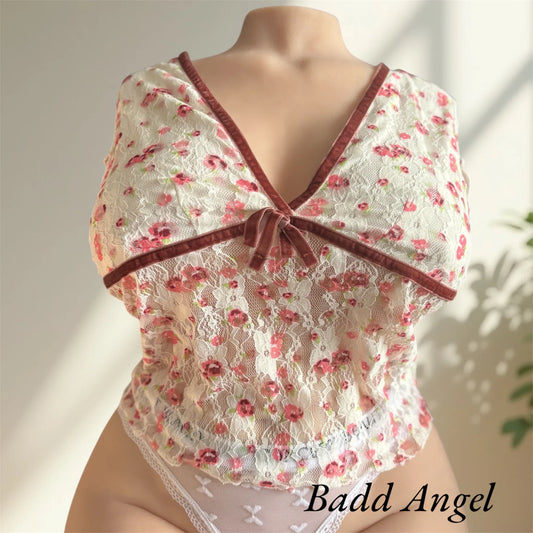 Badd Angel wearing a flowered top jennyfer